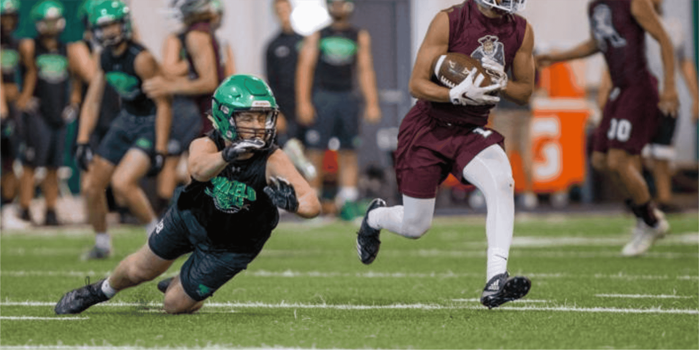 players playing soccer wearing 7on7 uniform